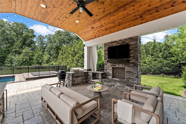 view of patio featuring an outdoor living space with a fireplace, fence, ceiling fan, and a fenced in pool