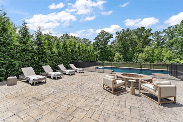 view of patio featuring a fenced in pool and fence