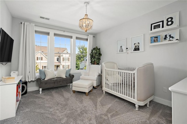 bedroom with a notable chandelier, carpet flooring, visible vents, and baseboards