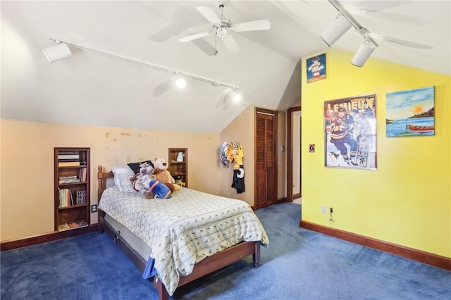 bedroom featuring ceiling fan, carpet flooring, baseboards, vaulted ceiling, and rail lighting