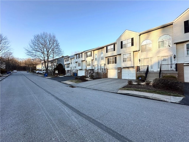 view of street featuring sidewalks and a residential view