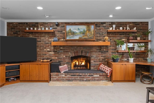 carpeted living room featuring crown molding, recessed lighting, a fireplace, and brick wall