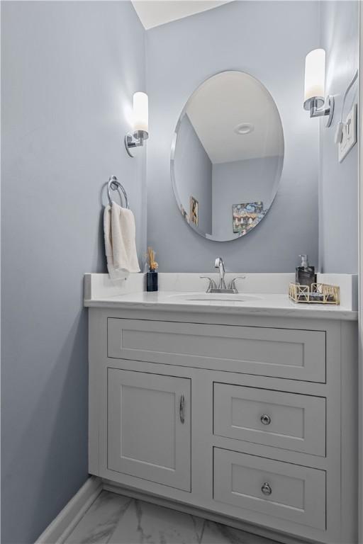 1921 Garrick Dr, Churchill Boro, PA 15235 - bathroom with marble finish floors, vanity, and baseboards