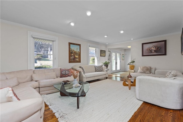 1921 Garrick Dr, Churchill Boro, PA 15235 - living area with wood finished floors, ornamental molding, and recessed lighting