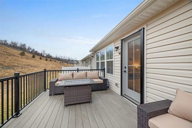 wooden deck with outdoor lounge area