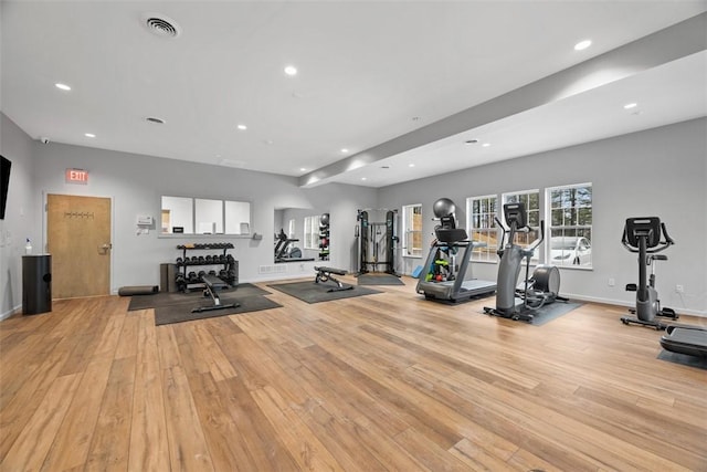 workout area with baseboards, wood finished floors, visible vents, and recessed lighting