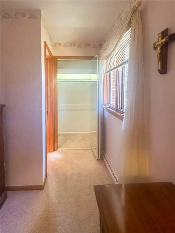 720 Dogwood Ln, Hermitage, PA 16148 - hall with a baseboard heating unit and light carpet