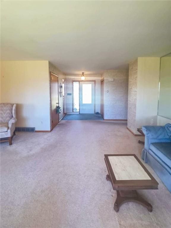 720 Dogwood Ln, Hermitage, PA 16148 - living room featuring carpet flooring, visible vents, and baseboards