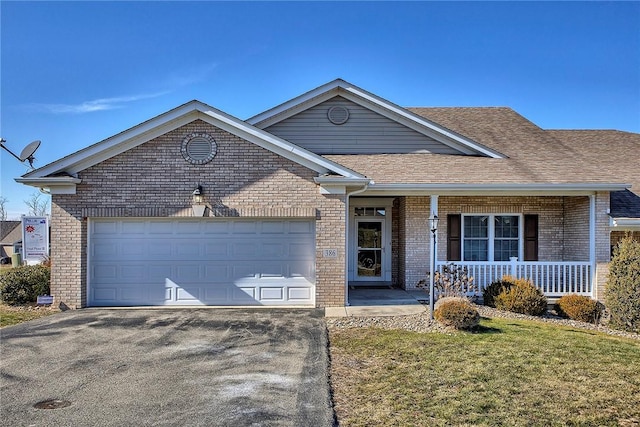 ranch-style house with aphalt driveway, brick siding, a shingled roof, covered porch, and an attached garage