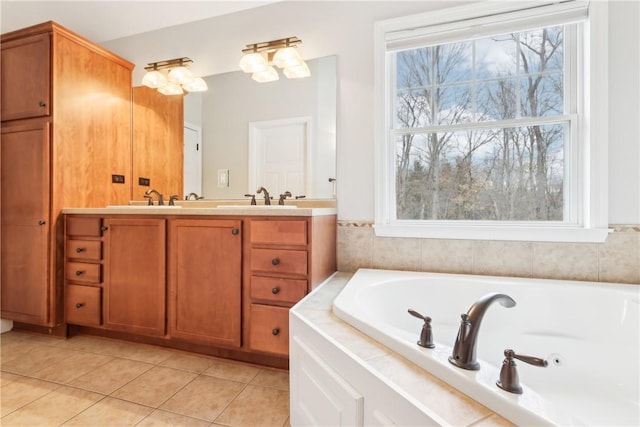 full bath with a bath, tile patterned flooring, double vanity, and a sink