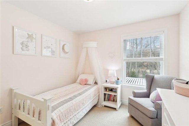 bedroom with light carpet