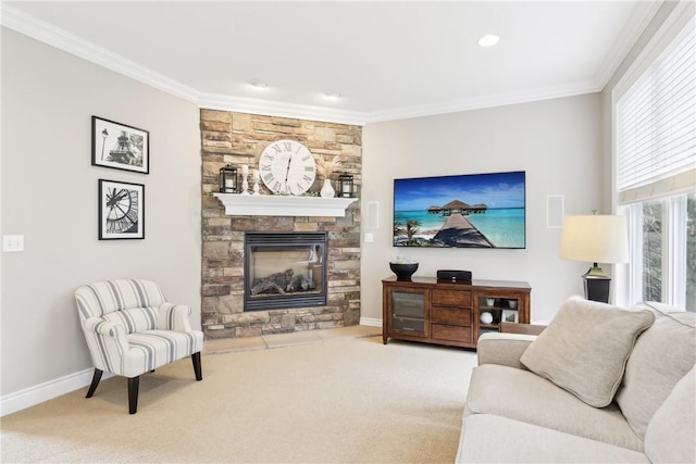 carpeted living room featuring ornamental molding, a fireplace, and baseboards