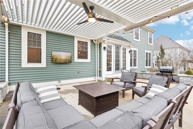 view of patio / terrace with a ceiling fan, an outdoor living space, and area for grilling