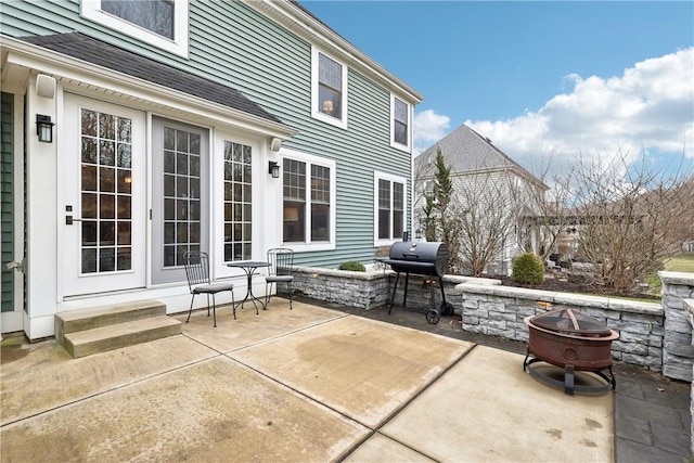 view of patio / terrace featuring a fire pit and area for grilling