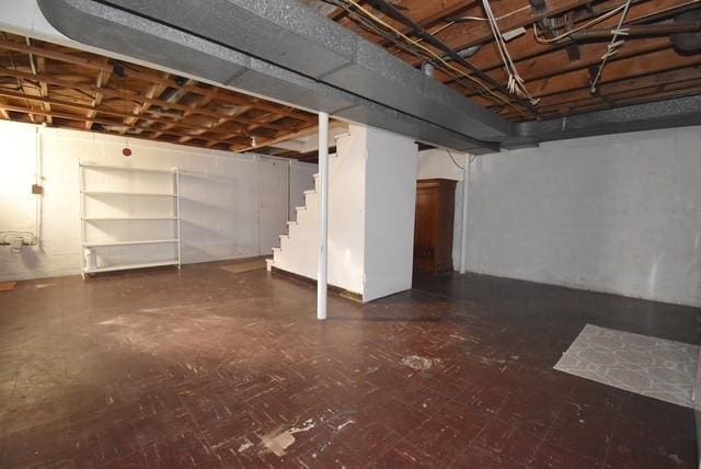 unfinished basement with stairs