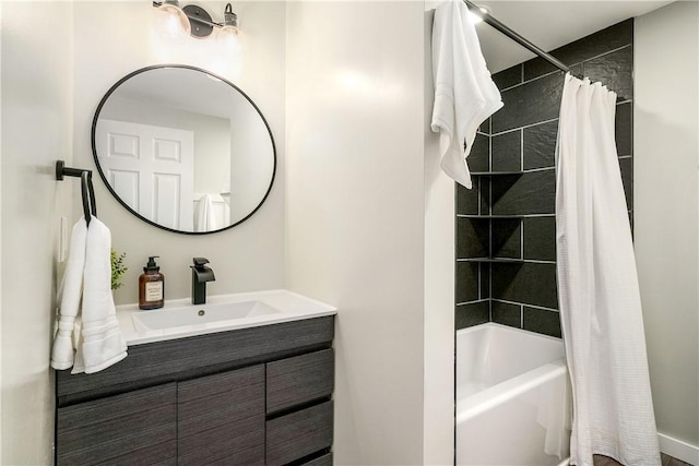 bathroom with shower / bath combination with curtain and vanity