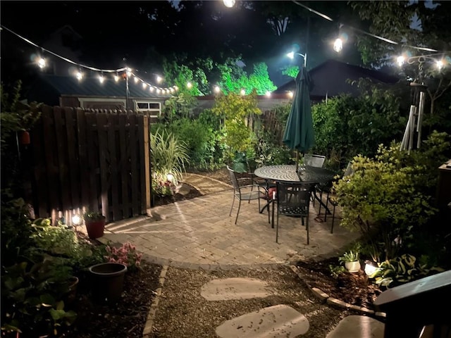 patio at twilight with fence