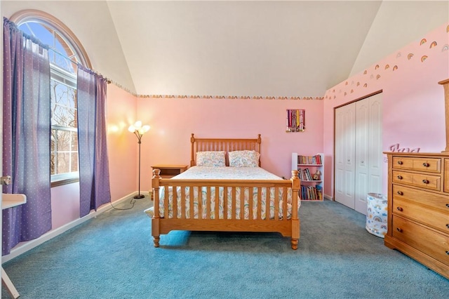 carpeted bedroom with lofted ceiling, multiple windows, and a closet