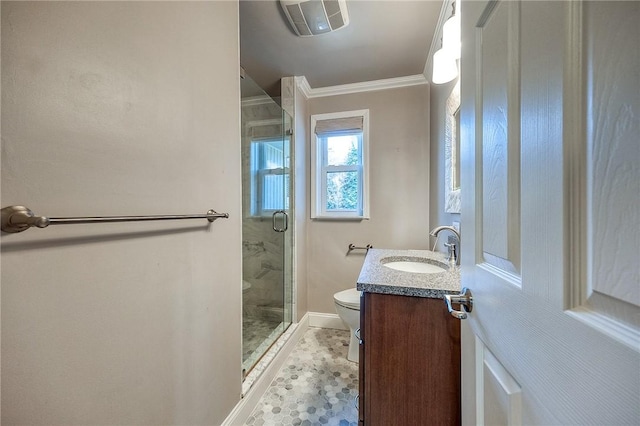 bathroom featuring toilet, a shower stall, crown molding, and vanity