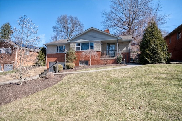 single story home featuring a garage, a chimney, a front lawn, and brick siding