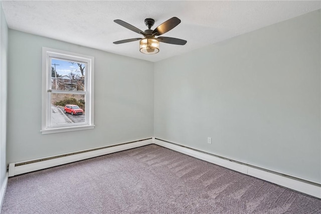 spare room with a baseboard heating unit, carpet floors, a textured ceiling, and a ceiling fan