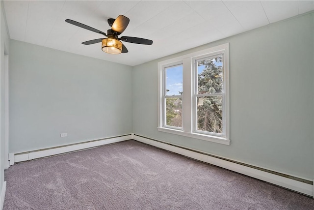 spare room with carpet floors, ceiling fan, and baseboard heating