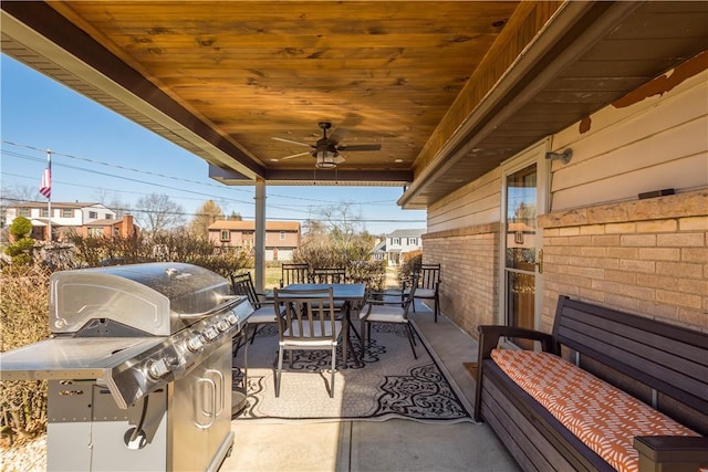 view of patio / terrace with a ceiling fan, outdoor dining area, and grilling area