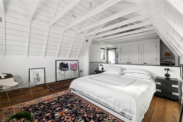 bedroom featuring dark wood-style floors, wood ceiling, and vaulted ceiling with beams