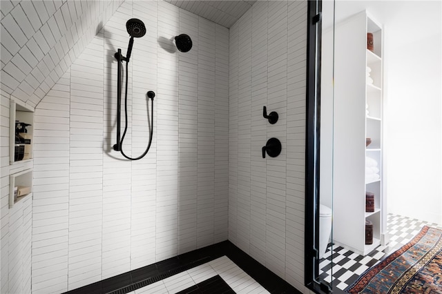 full bath featuring a tile shower