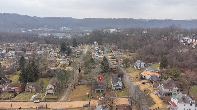 aerial view with a wooded view