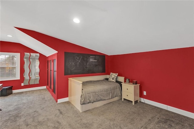 carpeted bedroom with vaulted ceiling, recessed lighting, and baseboards