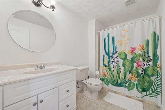 1012 Country Club Dr, Penn Twp Wml, PA 15644 - bathroom featuring visible vents, toilet, shower / tub combo with curtain, tile patterned floors, and vanity