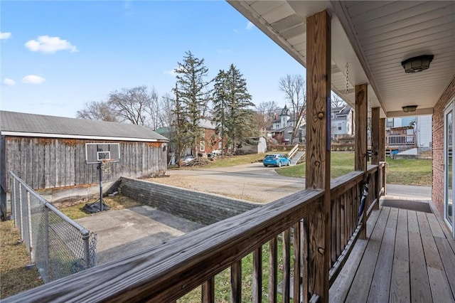 wooden deck featuring covered porch