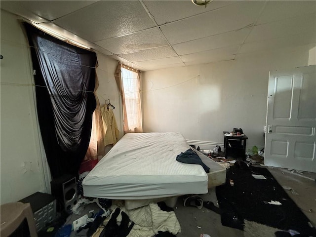 bedroom featuring a paneled ceiling