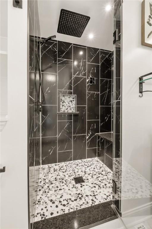 full bathroom featuring a stall shower