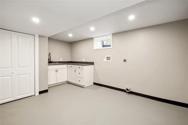 washroom featuring hookup for a washing machine, recessed lighting, electric dryer hookup, and baseboards