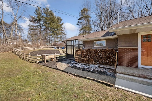 view of yard featuring fence