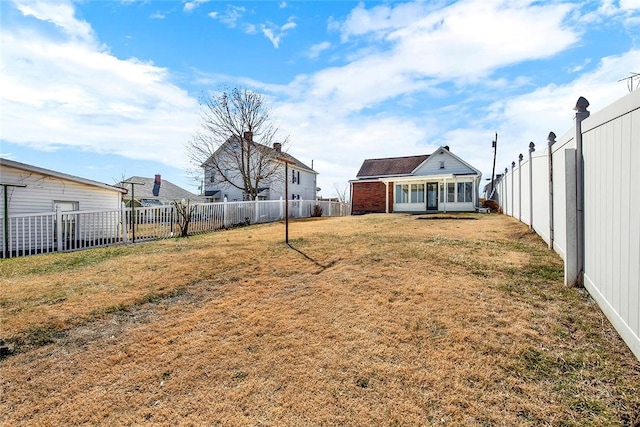 view of yard featuring a fenced backyard