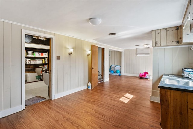 interior space featuring wood finished floors and baseboards