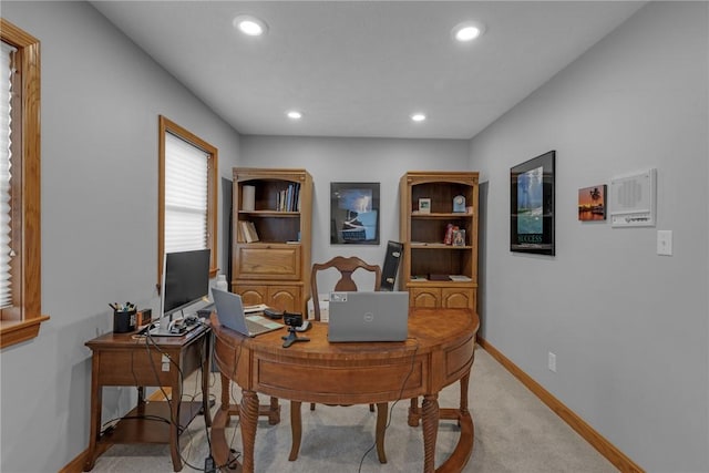 office area featuring recessed lighting, light colored carpet, and baseboards