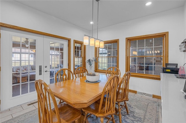 dining room with french doors, a healthy amount of sunlight, visible vents, and recessed lighting