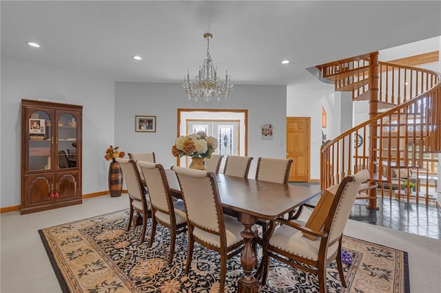 dining area featuring recessed lighting, stairway, baseboards, and an inviting chandelier