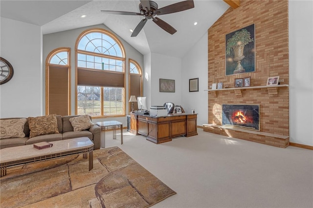 carpeted office with baseboards, ceiling fan, a fireplace, high vaulted ceiling, and recessed lighting