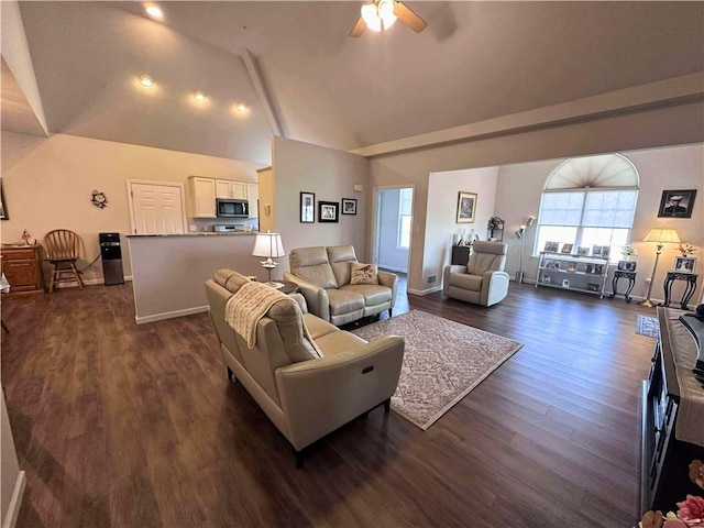 living room with high vaulted ceiling, ceiling fan, baseboards, and dark wood finished floors