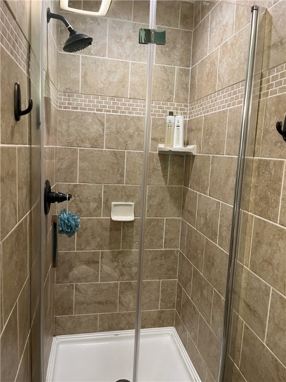 full bathroom featuring a stall shower