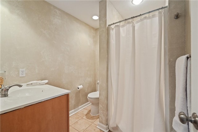 bathroom with vanity, a shower with shower curtain, tile patterned flooring, and toilet