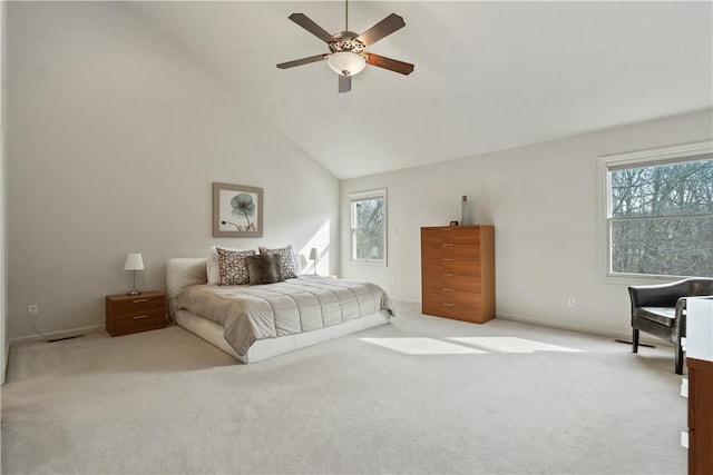 bedroom with carpet floors, high vaulted ceiling, and a ceiling fan