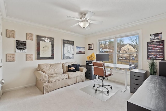 office area with carpet, baseboards, ornamental molding, and ceiling fan