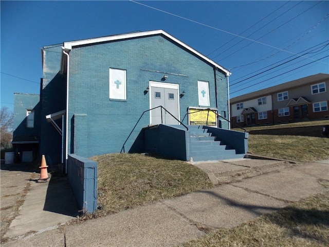 view of front of property with brick siding