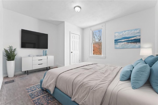 bedroom with carpet and visible vents